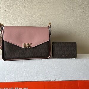 Michael Kors crossbody and matching wallet.